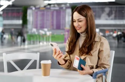 medium-shot-woman-holding-smartphone-1-410x270